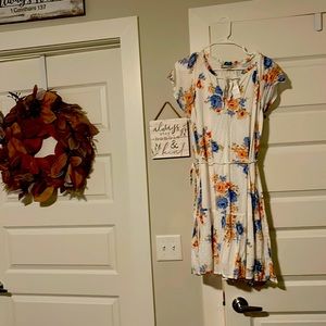 Beautiful Loft dress size Medium ruffle bottom